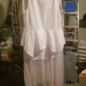 Sleeveless white romper with sheer bottom cover